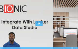 a man starting a presentation on Bionic's integration with Looker Data Studio.